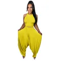 Détail d'un ensemble jaune haut sans manches à fronces et pantalon large pour femmes - S / Haut et Bas / Jaune