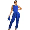 Detailweergave van de blauwe tweedelige set met mouwloze top en modieuze franjebroek - S / Boven- En Onderstuk / Blauw