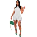 Detailed view of white sleeveless outfit set with fringe tassel shorts on model - S / Top And Bottom / White