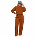 Detailed view of women's two-piece tracksuit featuring crop sweatshirt and wide-leg pants - Brown