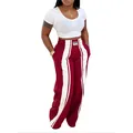 Vue complète du pantalon large tendance à rayures rouges et blanches avec taille élastique - S / Bas / Rouge