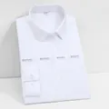 Camisa clásica blanca de manga larga para hombre con tejido elástico y entallada - 35 / Tops / Blanco