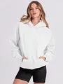 Classic white oversized hoodie with functional front pocket for a cozy casual autumn look - S / Tops / White