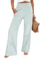 Close-up detail of women's high-waisted striped wide-leg trousers featuring a smocked waist - S / Bottoms / Light Green