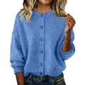 Detail view of a soft blue knitted cardigan for women featuring a cozy button-up design. - Blue