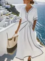 Elegant white V-neck maxi dress with black trim in a Mediterranean coastal resort style - White