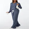 Full-body detail of a navy blue ribbed two-piece loungewear set with V-neck button top - S / Top And Bottom / Navy Blue