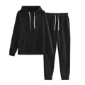 Two-piece black women's tracksuit set featuring a hooded sweatshirt and matching jogger pants - S / Top And Bottom / Black