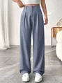 Front view detail of elegant high-waisted straight-leg suit trousers in a soft blue finish. - Blue