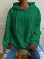 Detalle de una sudadera con capucha verde para mujer con diseño de punto trenzado - Verde