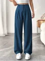 Front view of elegant deep blue high-waisted straight-leg suit trousers for women - Teal