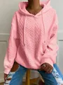 Vista detallada de sudadera rosa con capucha de punto de ochos, cordón y tejido jacquard - S / Tops / Rosa