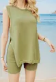 Blonde model wearing a moss green knit sleeveless top and shorts set on the beach - Matcha Green