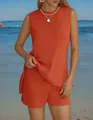 Detail showing the texture and fit of orange casual sleeveless top and shorts - Orange Red
