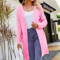 Close-up of pink cable knit hooded cardigan showing the intricate woven texture - Bright Pink