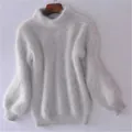 Elegante maglione grigio chiaro in maglia di visone con maniche a lanterna e collo a lupetto - Grigio