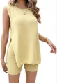 Detail view of yellow knit two-piece set featuring side-slit tank top and ribbed shorts - Light Yellow