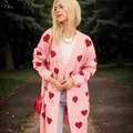 Stylish pink knit cardigan with red heart pattern and loose oversized fit for winter - S / Tops / Pink