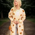 Cozy oversized cream knit cardigan for women featuring a charming brown heart pattern - S / Tops / Beige