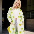 Women's mint green knit cardigan with yellow heart patterns in a loose fit - Light Yellow