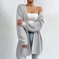 Stylish women's loose grey knit cardigan featuring elegant hollow sleeve details - S / Tops / Light Gray