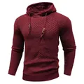 Detail of men's burgundy hooded sweater with textured knit pattern and drawstrings - Dark Red
