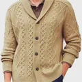 Detailed view of a khaki cable-knit cardigan featuring a shawl collar and buttons. - Khaki