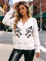 Stylish woman wearing a white retro wolf jacquard zip-up knit cardigan in city street - XS / Tops / White