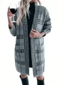 Elegant grey and black houndstooth long knitted cardigan shown on model with wine glass - S / Tops / Gray