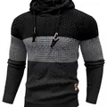 Detail view of textured knit and color-block design on men's hooded casual sweater. - Black