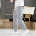 Pantalon large et décontracté en coton et lin gris clair pour hommes - M / Bas / Gris clair