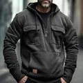 Detail of men's charcoal half-zip hoodie featuring chest pockets and front pouch - S / Tops / Gray
