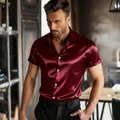 Close-up detail of burgundy men's short sleeve satin shirt with premium glossy finish. - Burgundy