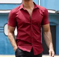 Detailed view of slim-fit men's short sleeve casual shirt in solid red with black buttons - S / Tops / Red