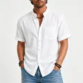 Close-up of a men's white short-sleeve linen shirt featuring a casual stand-up collar - S / Tops / White