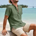 Detail view of green linen men's retro beach shirt with pocket and Henley collar. - Army Green