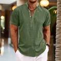 Detailed view of men's olive green linen shirt with a mandarin collar and half-placket - S / Tops / Army Green