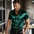 Detail view of a premium dark green glossy short-sleeved shirt for men with a satin finish - Green