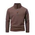 Detailed view of men's brown quarter-zip tactical fleece with red contrast stitching - Coffee