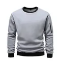Close-up of men's grey fleece sweatshirt with black trim and sleeve zipper detail - S / Tops / Light Gray