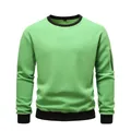 Front view of green fleece sweatshirt showing black ribbed collar and sleeve zipper - M / Tops / Light Green