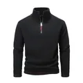 Close-up of black tactical polar fleece pullover with red contrast stitching - S / Tops / Black