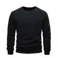 Close-up of a black crew neck sweatshirt featuring a utility zipper pocket on the sleeve - S / Tops / Black