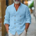 Detail view of men's light blue double-breasted linen shirt with stand collar - S / Tops / Sky Blue