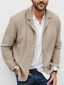 Detail view of men's linen cotton blazer showing fabric texture and single-breasted buttons. - S / Tops / Khaki