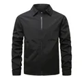 Front view detail of a classic black men's zip-up windbreaker jacket with a pointed collar - S / Tops / Black