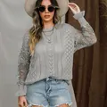 Detailed view of grey lace floral long sleeve knit sweater with ruffled flare cuffs - S / Tops / Gray
