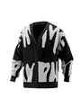Detail view of a stylish V-neck knitted cardigan with black and white graffiti pattern - S / Tops / Black