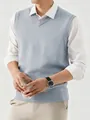 Detail shot of a men's light blue V-neck knitted sweater vest for stylish layering - S / Tops / Gray
