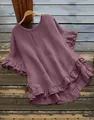 Detailed view of elegant purple women's blouse with ruffled sleeves and high-low hemline design - Light Purple